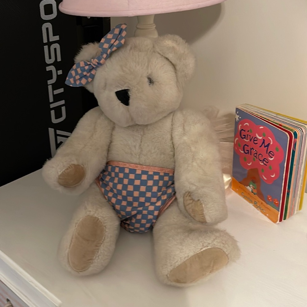 Vermont Teddy bear. Pink and blue plaid diaper and bow. From 1995.